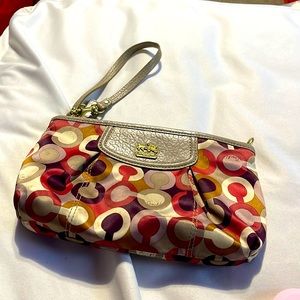 Monogrammed multi colored Coach wallet wristlet used a few times